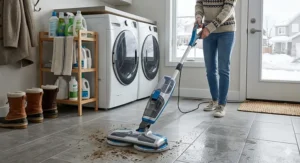 Photorealistic electric mop cleaning large ceramic tiles in a Canadian mudroom during the winter season.