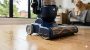 Close-up of non-marring rubber wheels on an upright vacuum for pet hair and hardwood to prevent scratches.